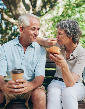 senior couple on bench eating breakfast louisville ky evansville il what is an iul